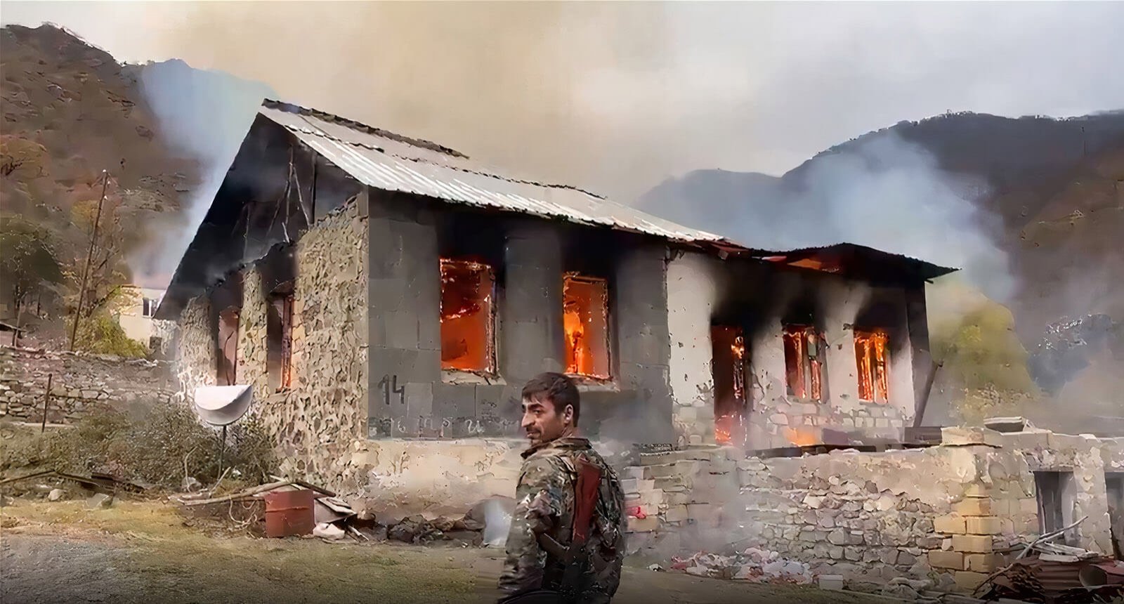 Residents of Armenian territories set fire to homes and move graves to avoid vandalism by Azerbaijan forces after land swap in a Russia-brokered peace deal